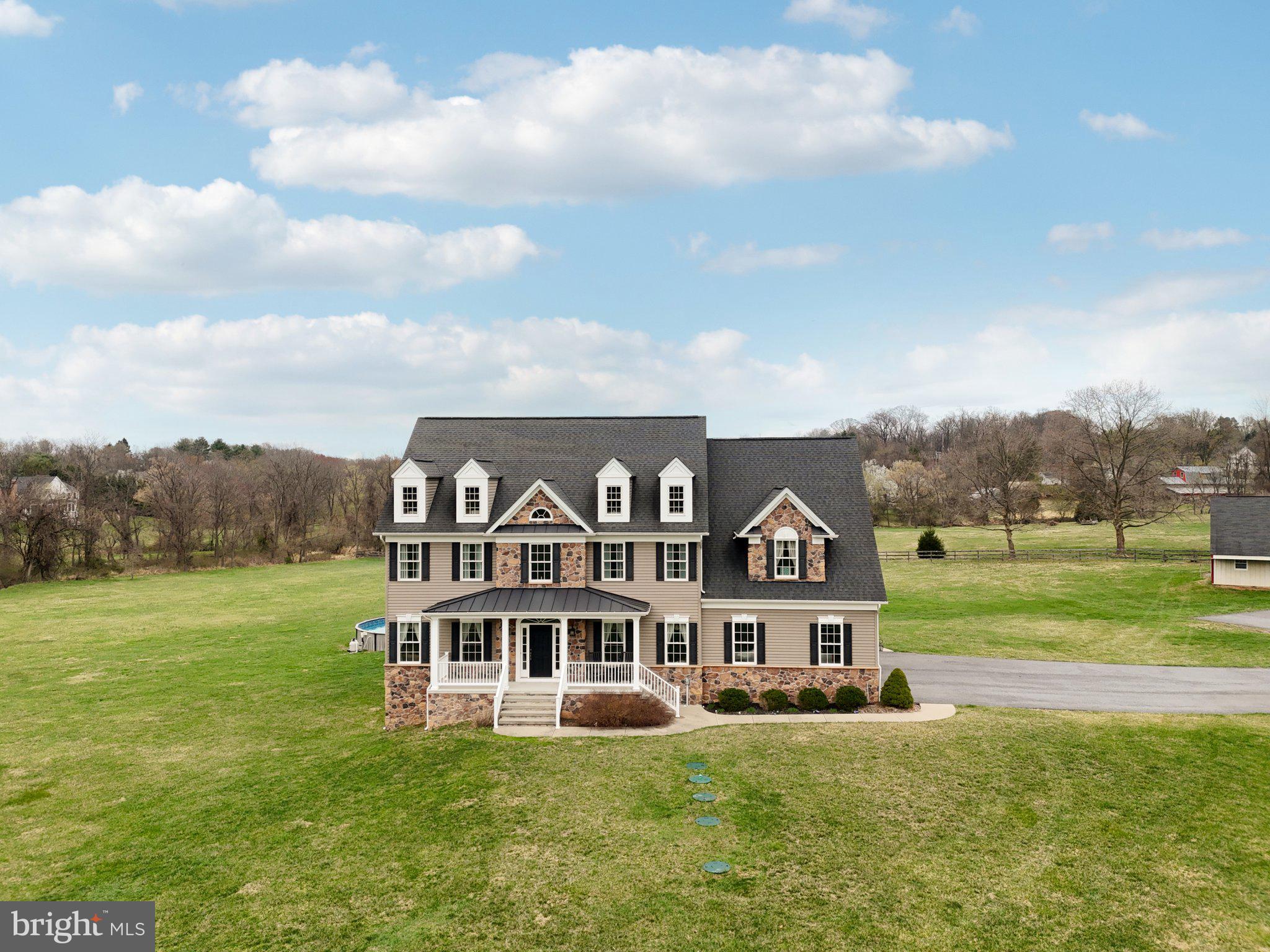 13936 Rover Mill Road West Friendship, MD 21794 - Photo 55 of 73 a view of a big house with a big yard and large trees
