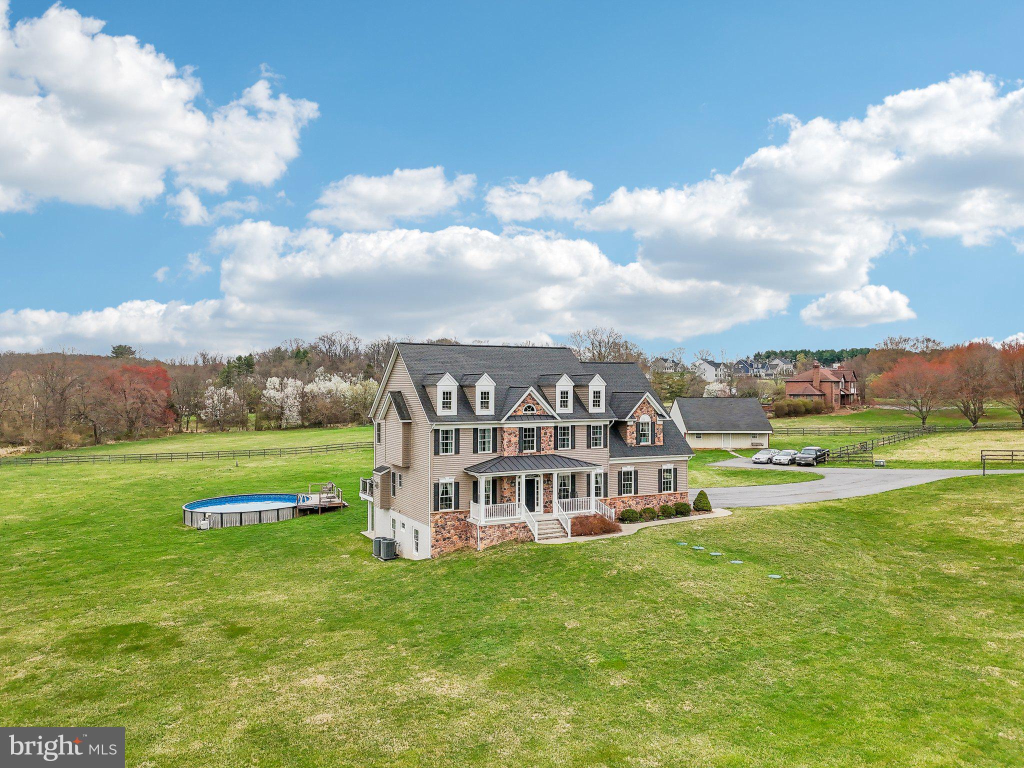 13936 Rover Mill Road West Friendship, MD 21794 - Photo 56 of 73 a view of a house with a big yard and large trees