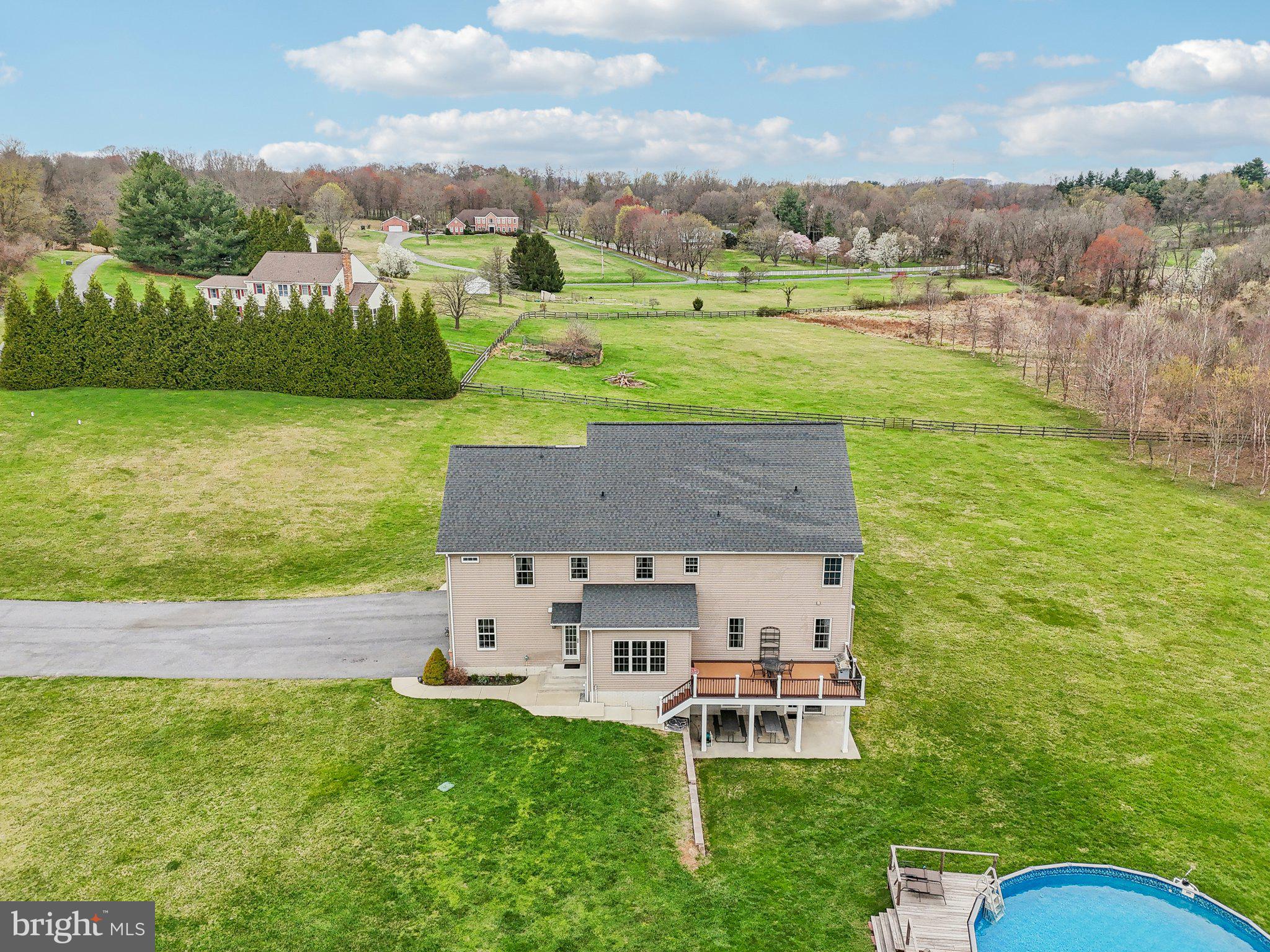 13936 Rover Mill Road West Friendship, MD 21794 - Photo 65 of 73 a aerial view of a house with a yard basket ball court and outdoor seating