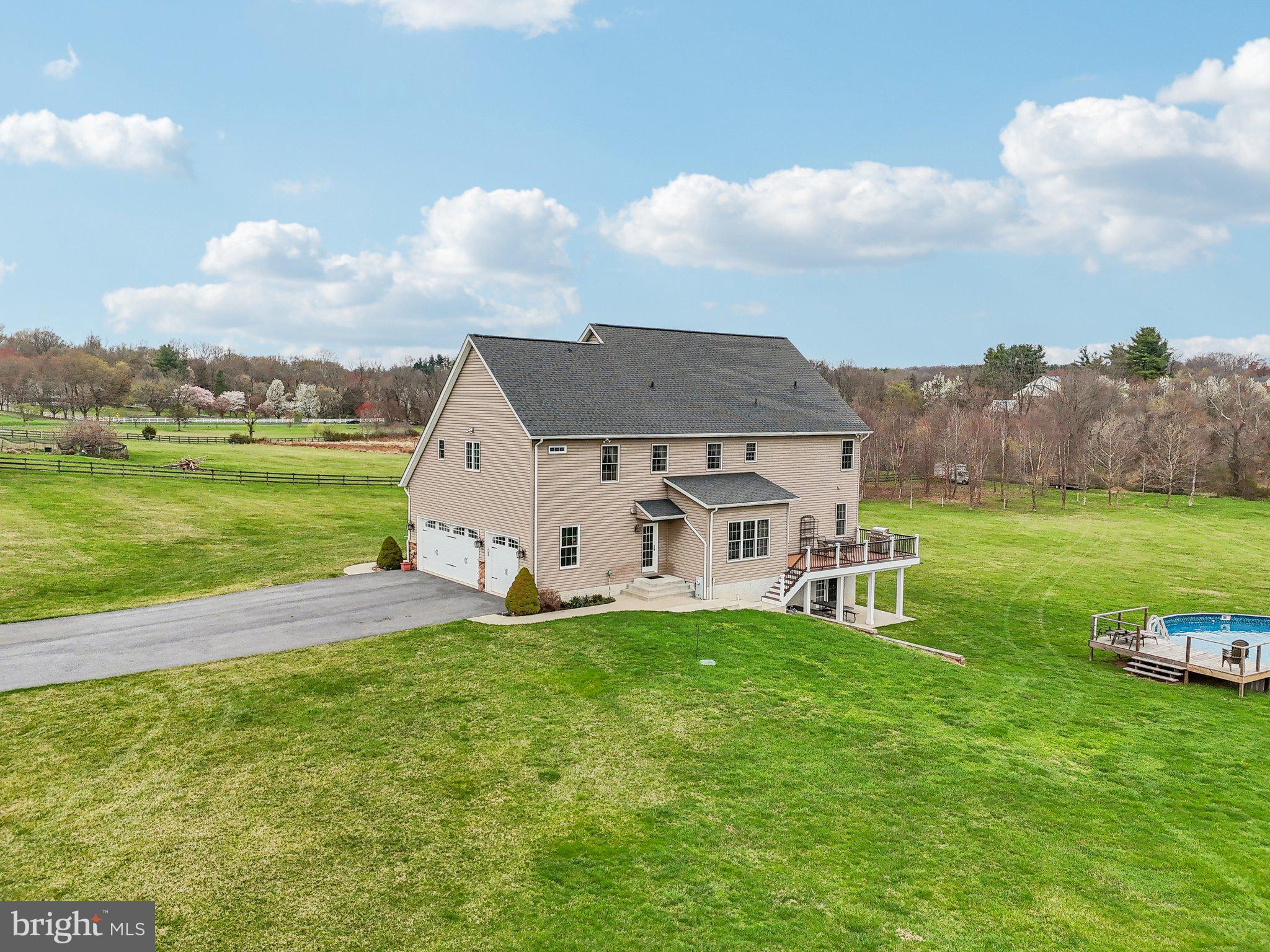 13936 Rover Mill Road West Friendship, MD 21794 - Photo 69 of 73 a view of a house with a big yard and a large tree