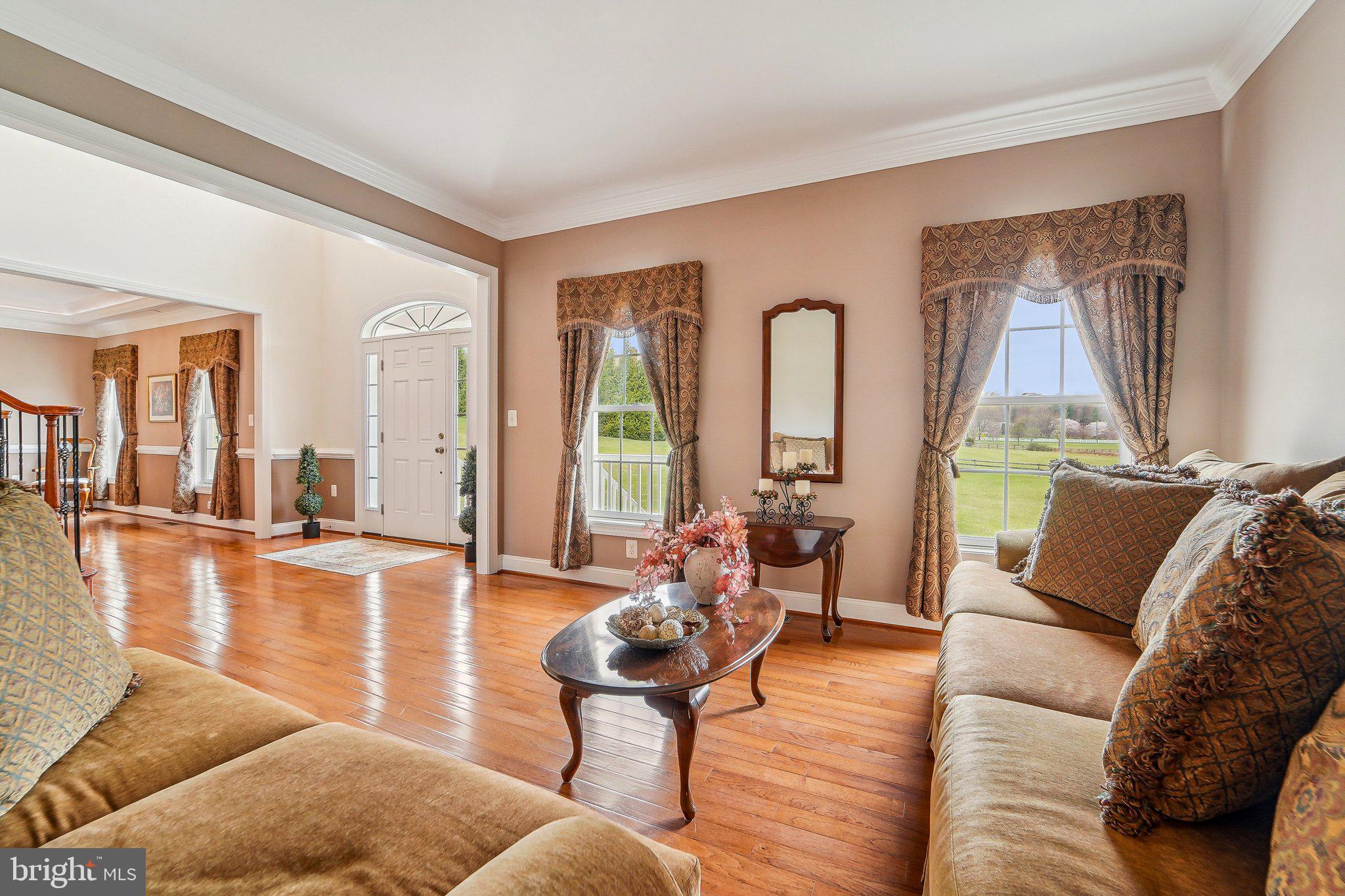 13936 Rover Mill Road West Friendship, MD 21794 - Photo 7 of 73 a living room with furniture and a large window