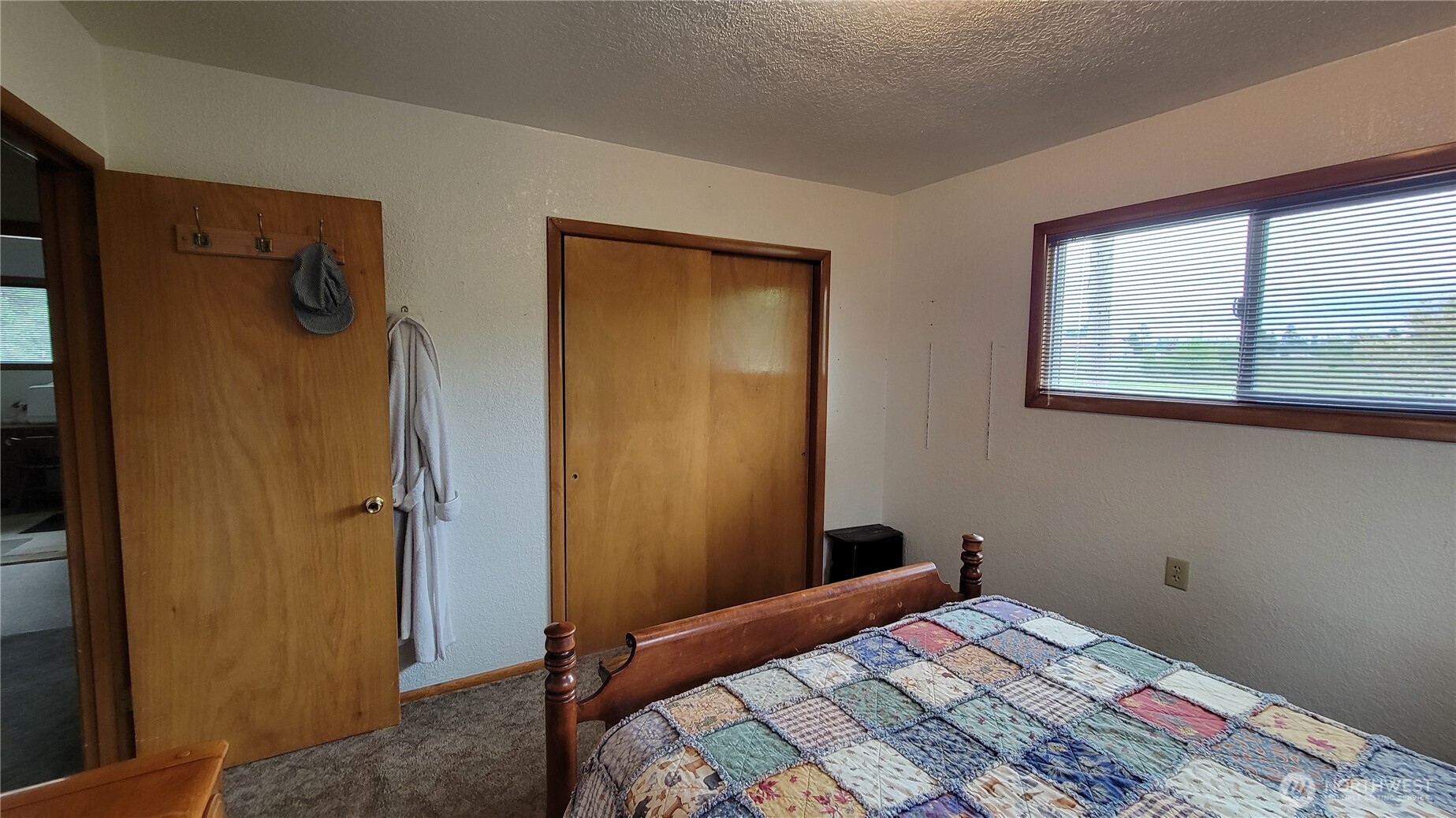 1296 Highway 12 Chehalis, WA 98532 - Photo 14 of 33 a bedroom with a bed and a window