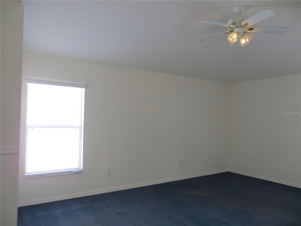1012 Torreya Way Odessa, FL 33556 - Photo 16 of 40 an empty room with a window