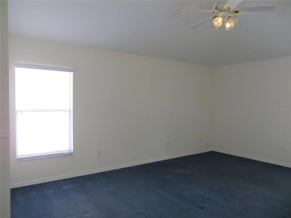 1012 Torreya Way Odessa, FL 33556 - Photo 17 of 40 an empty room with a window