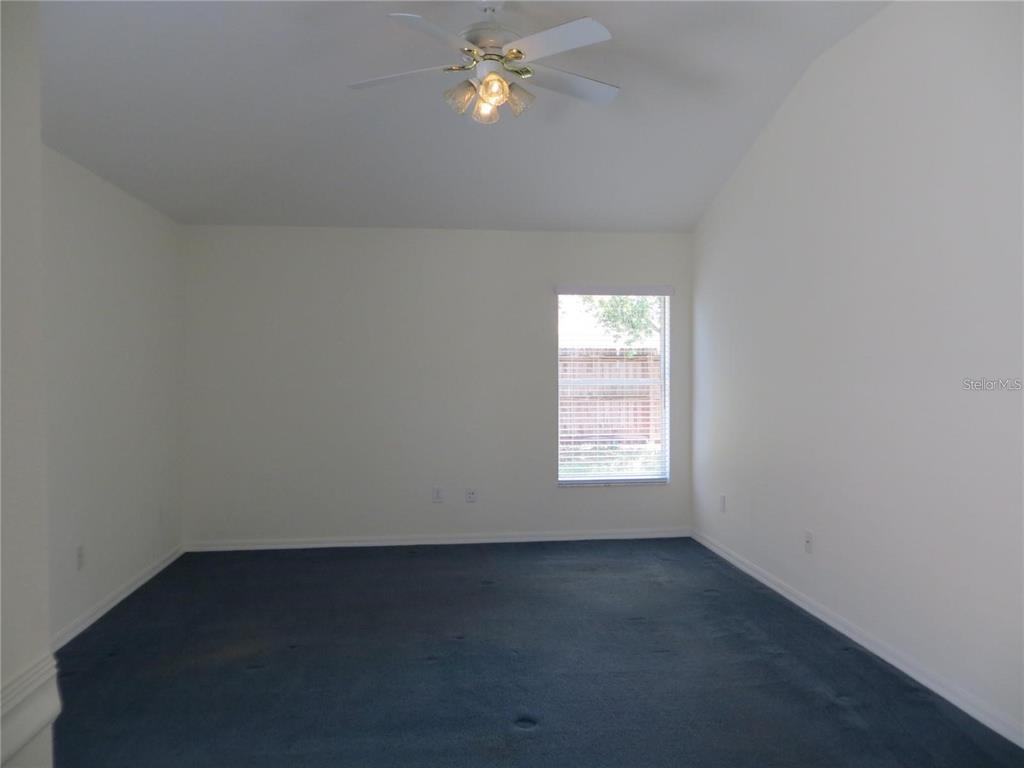 1012 Torreya Way Odessa, FL 33556 - Photo 19 of 40 an empty room with a window