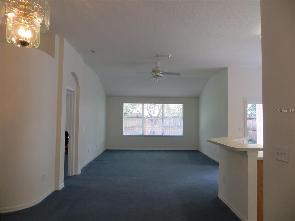 1012 Torreya Way Odessa, FL 33556 - Photo 2 of 40 an empty room with a empty space and windows