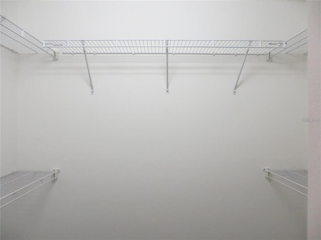 1012 Torreya Way Odessa, FL 33556 - Photo 28 of 40 a view of a room with racks on the wall