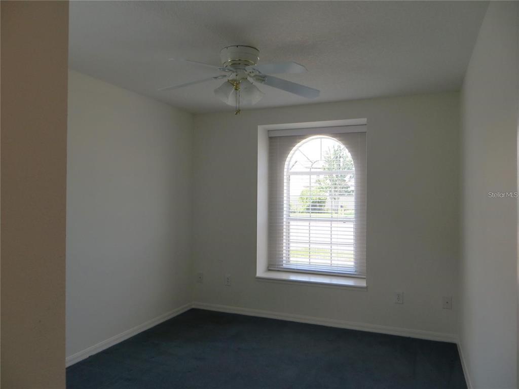 1012 Torreya Way Odessa, FL 33556 - Photo 30 of 40 an empty room with a window