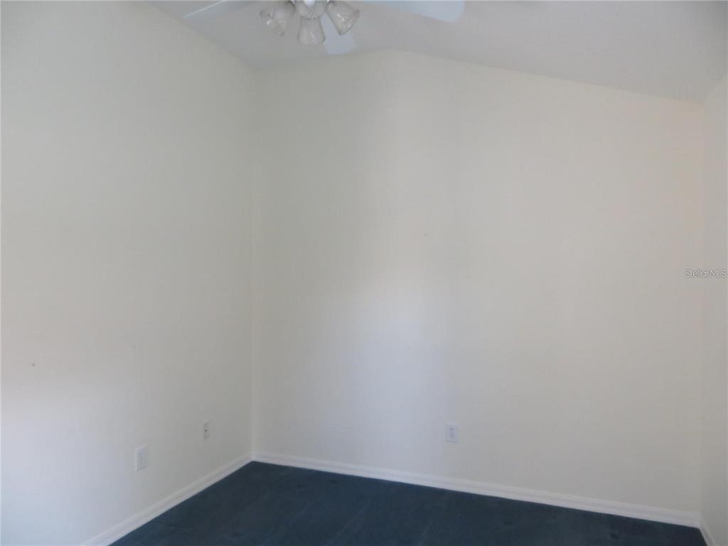 1012 Torreya Way Odessa, FL 33556 - Photo 34 of 40 a room that has a white wall