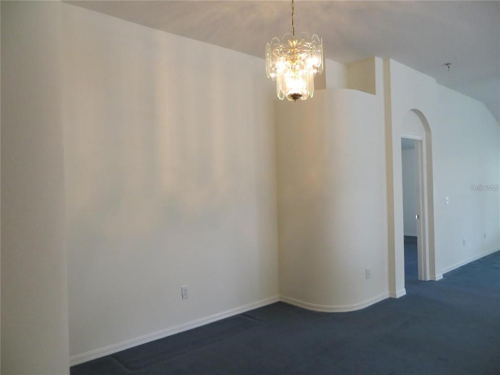 1012 Torreya Way Odessa, FL 33556 - Photo 4 of 40 a view of a chandelier in big room