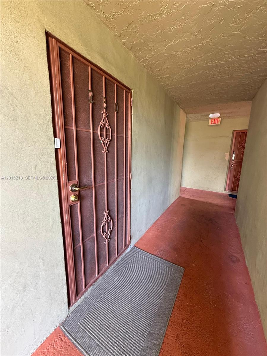 9321 Southwest 4th Street, Unit 230C Miami, FL 33174 - Photo 4 of 37 a view of a hallway