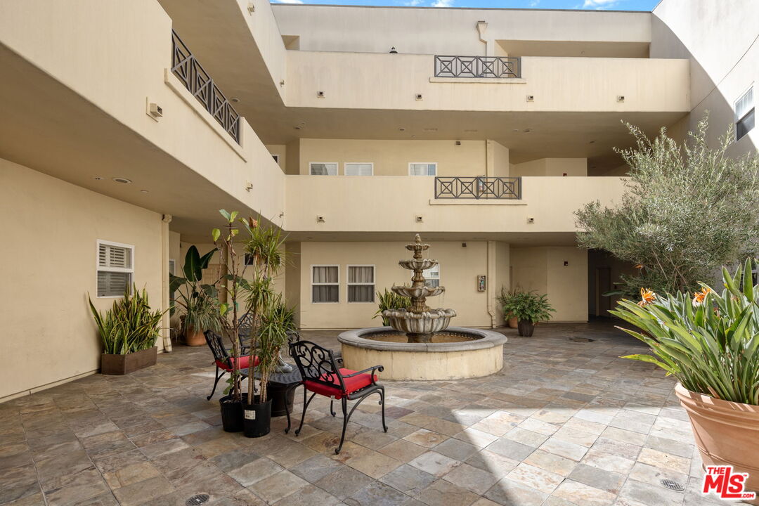4400 Cartwright Avenue, Unit 102 North Hollywood, CA 91602 - Photo 19 of 21 a view of outdoor space with seating area