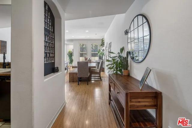 a view of a livingroom with furniture and wooden floor