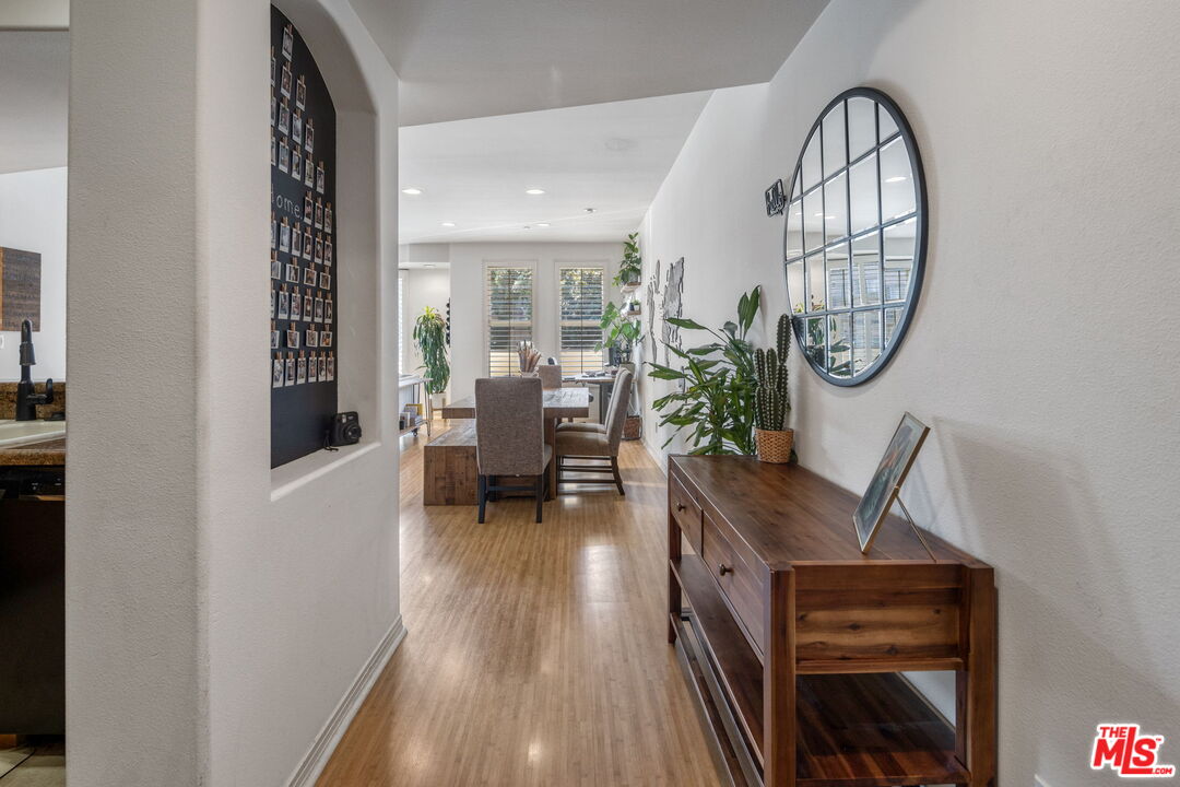 4400 Cartwright Avenue, Unit 102 North Hollywood, CA 91602 - Photo 2 of 21 a view of a livingroom with furniture and wooden floor