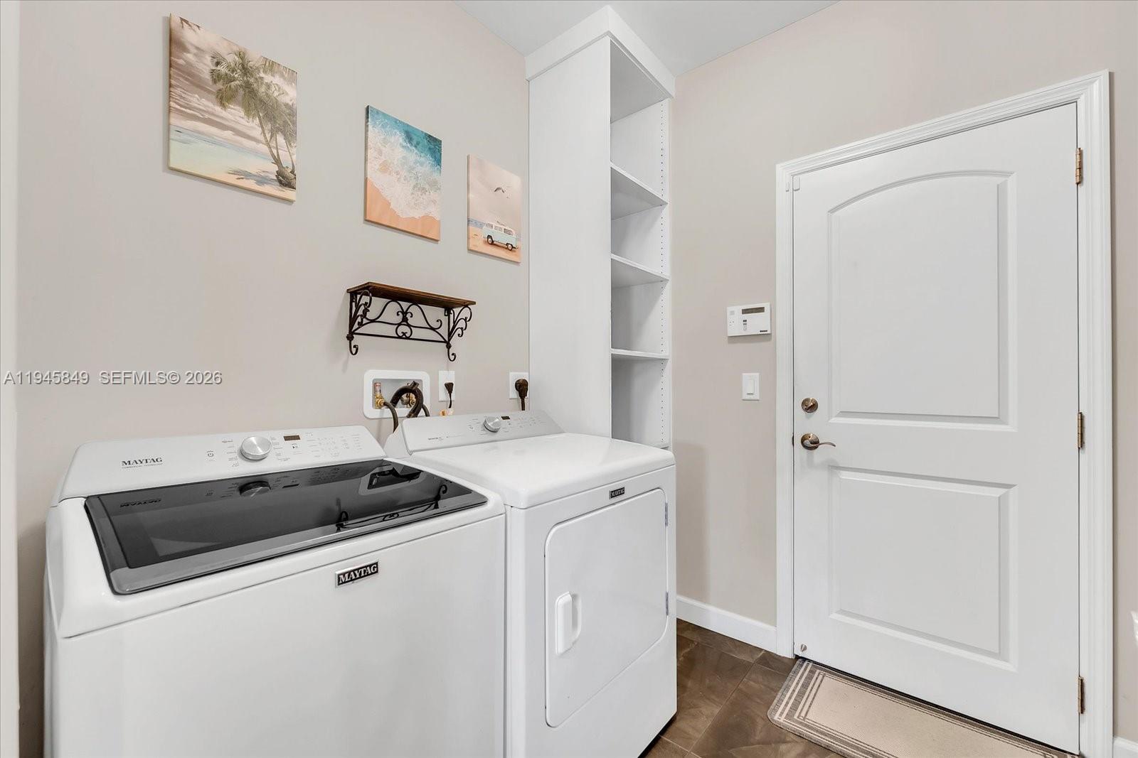 15150 Southwest 240th Street Homestead, FL 33032 - Photo 27 of 38 a utility room with dryer and washer