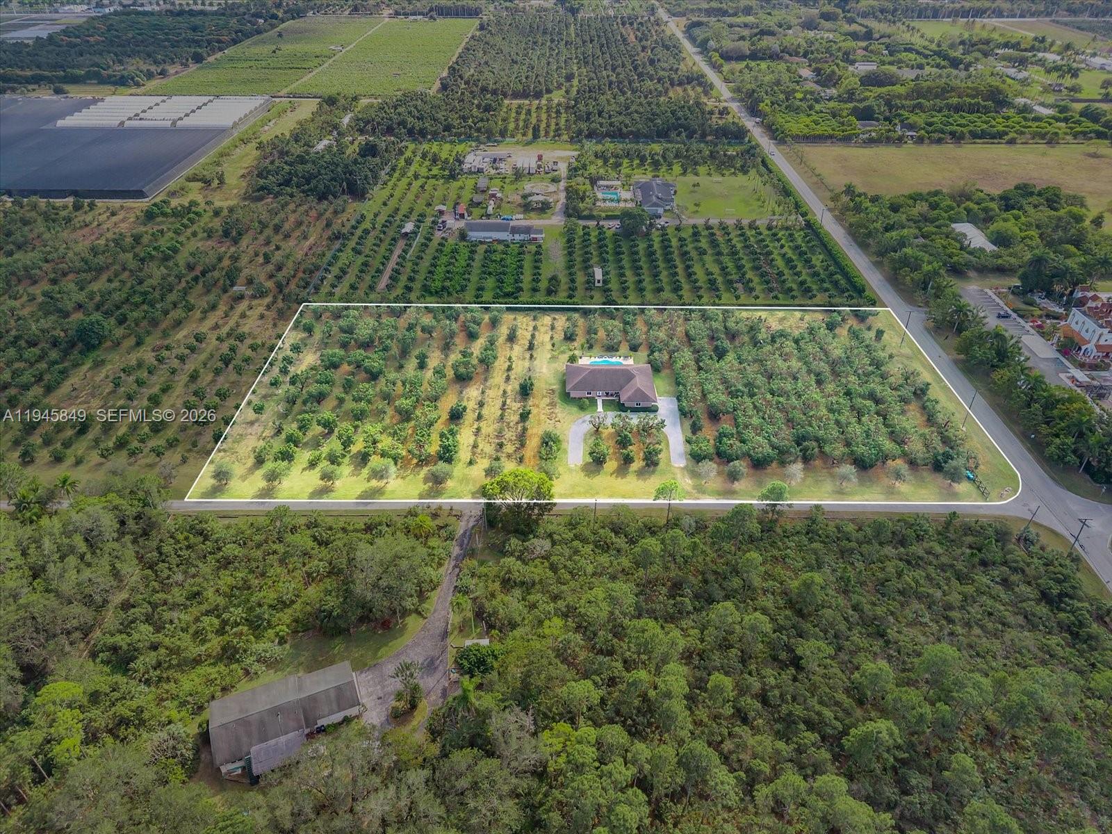 15150 Southwest 240th Street Homestead, FL 33032 - Photo 34 of 38 a view of swimming pool with a yard