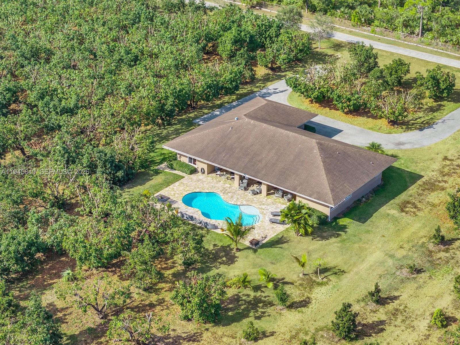 15150 Southwest 240th Street Homestead, FL 33032 - Photo 37 of 38 a view of a backyard