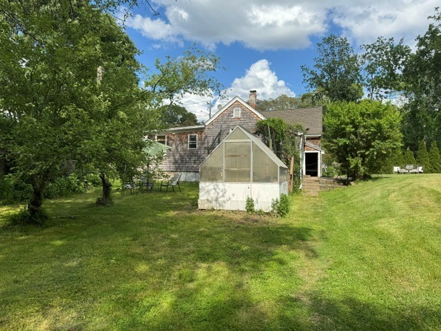 106 North Road South Kingstown, RI 02879 - Photo 33 of 36 Back view of property- private with outdoor space and greenhouse
