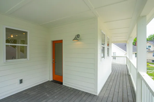 a view of a wooden floor and outdoor space