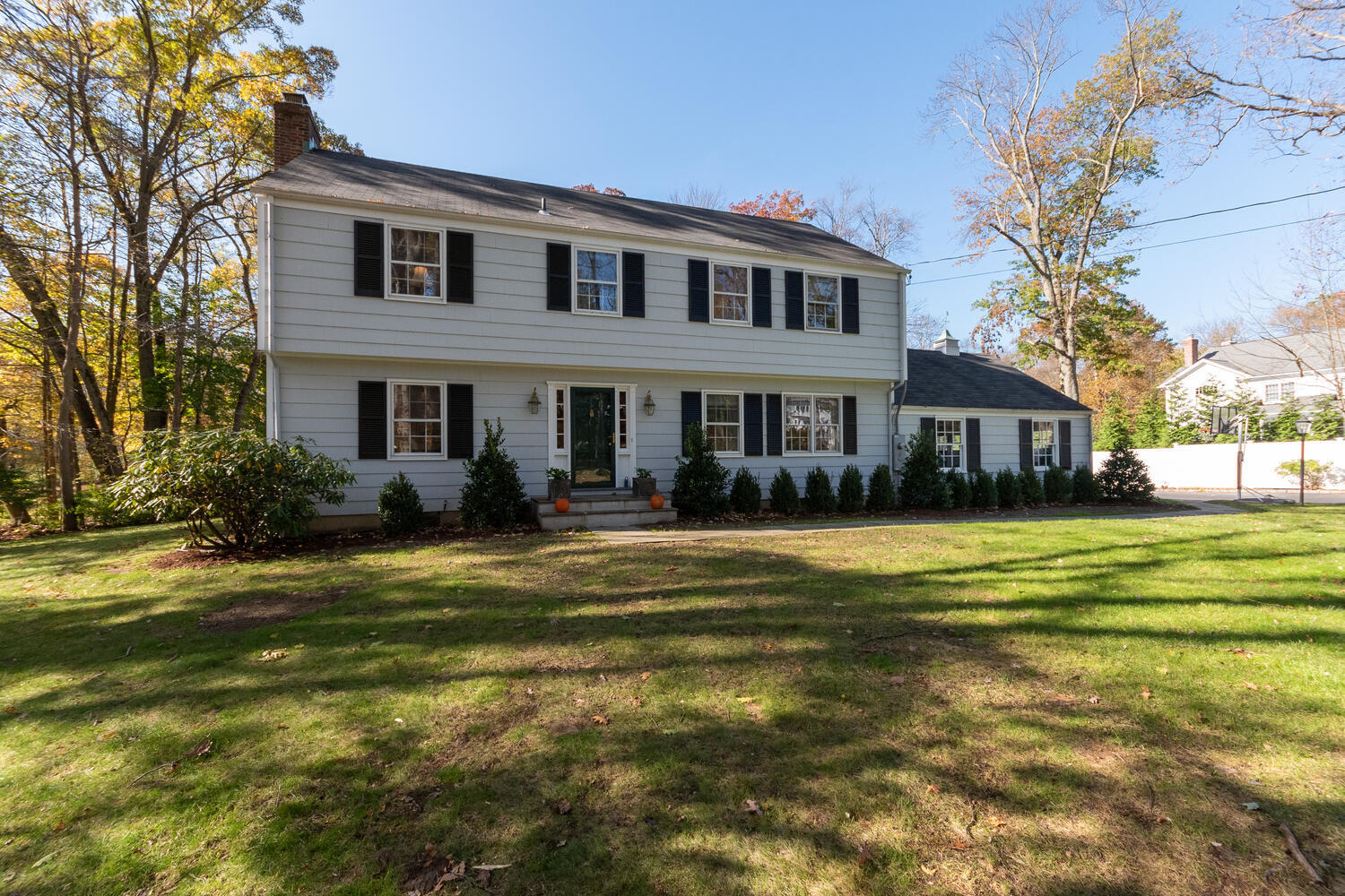 297 Brookside Road Darien, CT 06820 - Photo 2 of 63 a front view of a house with a swimming pool