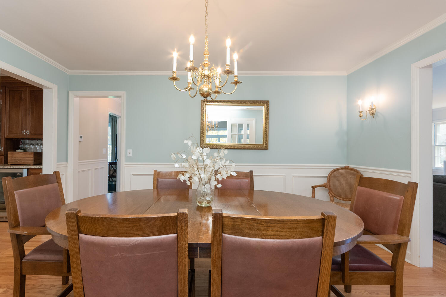 297 Brookside Road Darien, CT 06820 - Photo 12 of 63 a dining room with furniture and chandelier