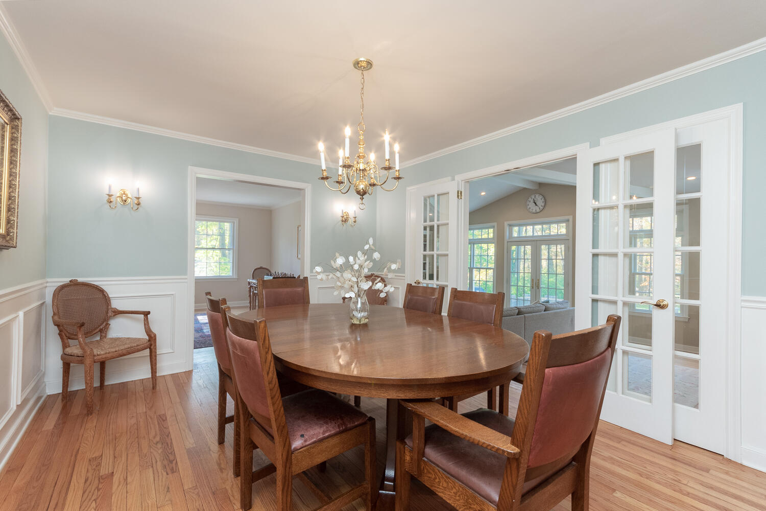 297 Brookside Road Darien, CT 06820 - Photo 14 of 63 a view of a dining room with furniture and wooden floor