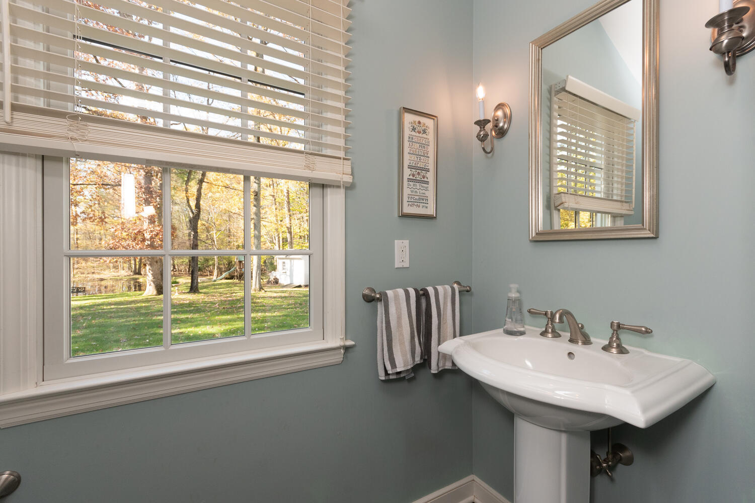 297 Brookside Road Darien, CT 06820 - Photo 15 of 63 a bathroom with a sink and a window