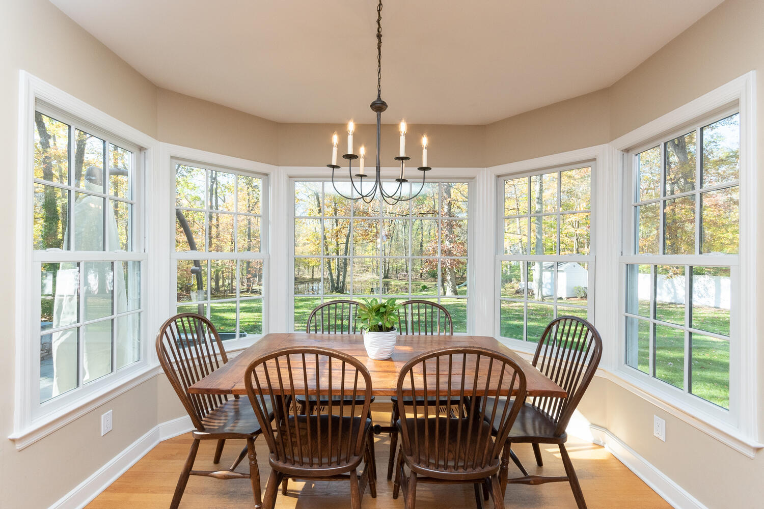 297 Brookside Road Darien, CT 06820 - Photo 18 of 63 a view of a dining room with furniture wooden floor and chandelier