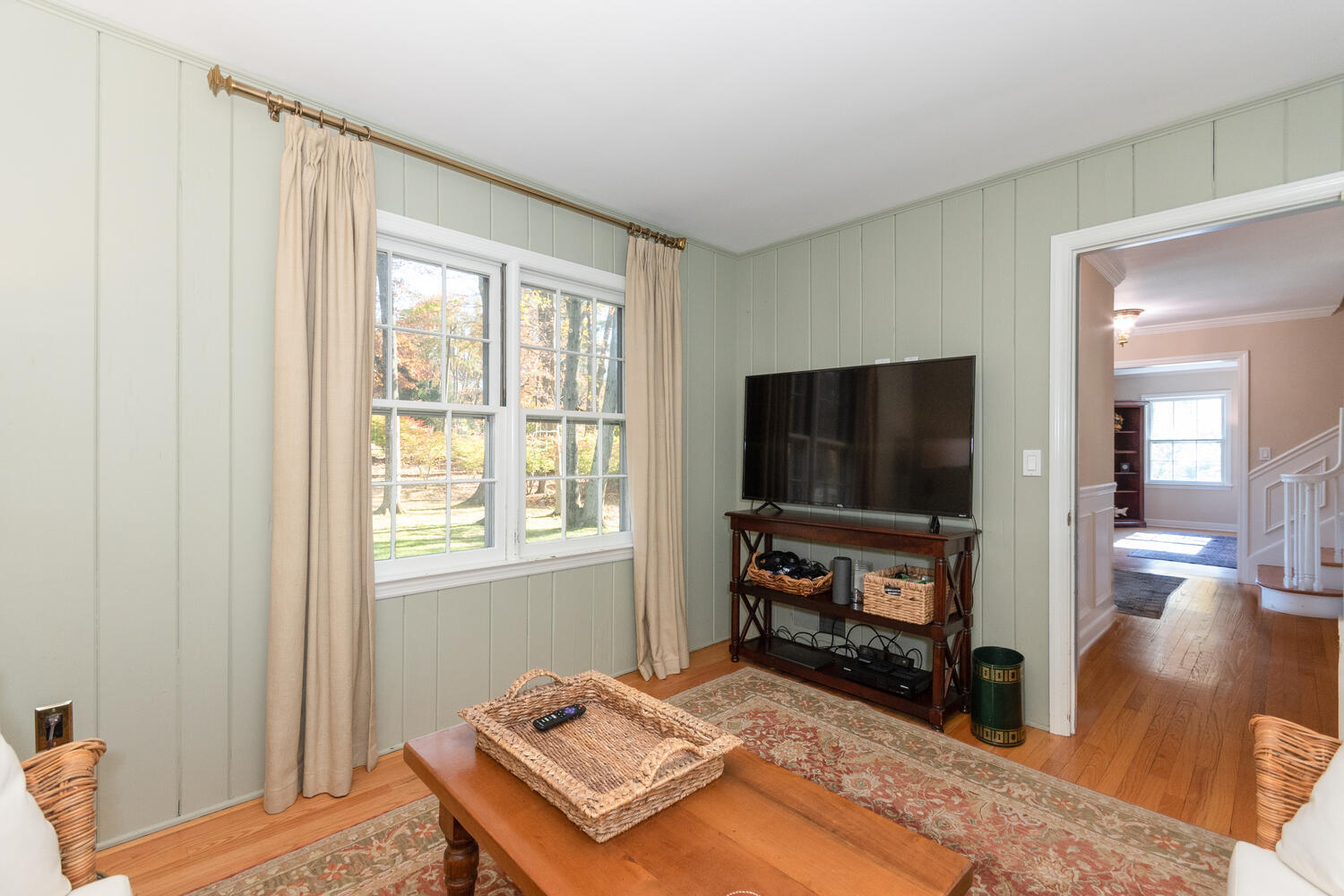 297 Brookside Road Darien, CT 06820 - Photo 27 of 63 a living room with furniture and a flat screen tv