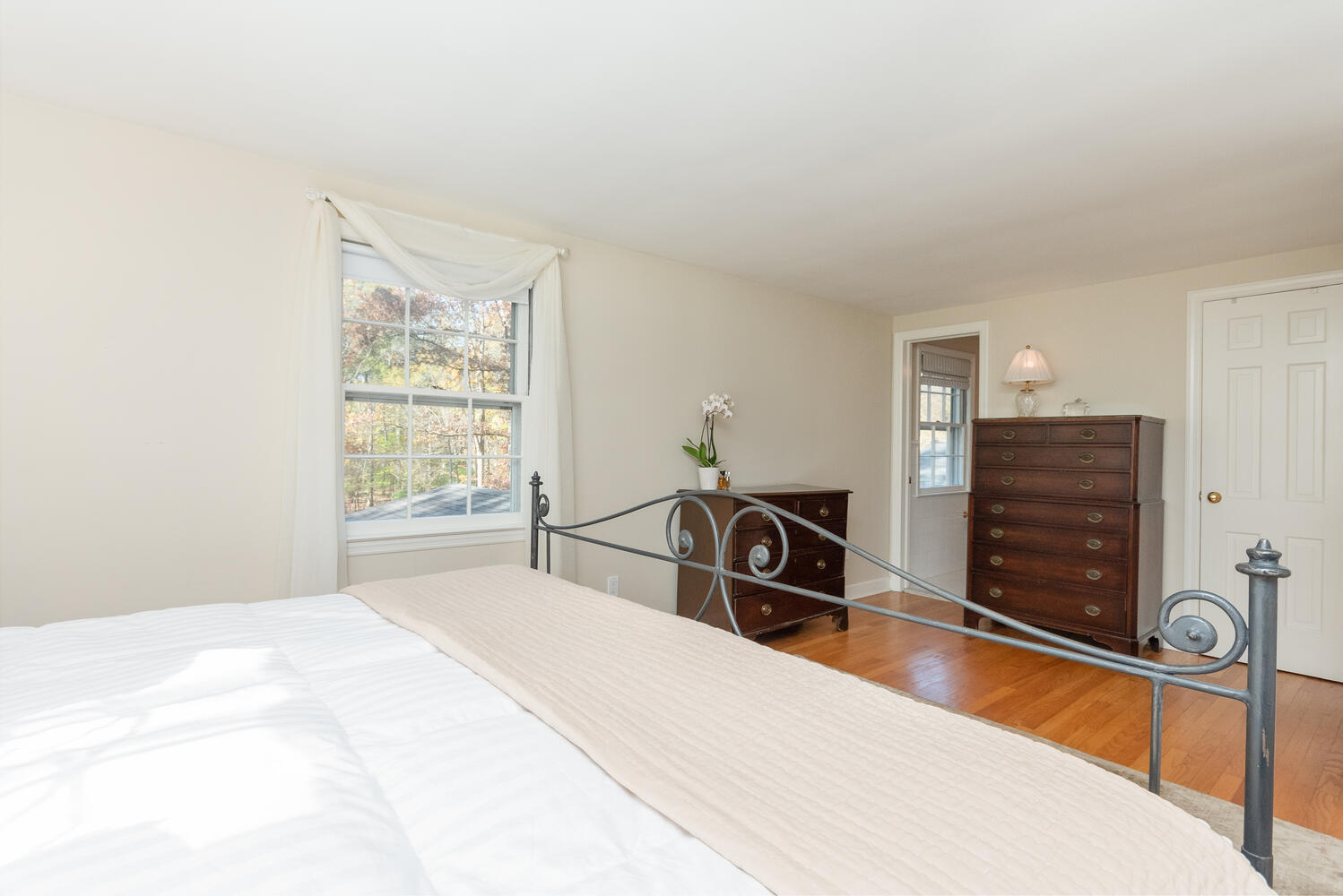 297 Brookside Road Darien, CT 06820 - Photo 31 of 63 a bedroom with a bed and a dresser