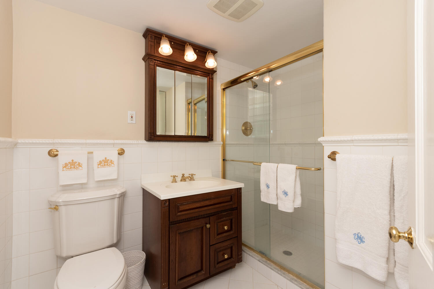 297 Brookside Road Darien, CT 06820 - Photo 32 of 63 a bathroom with a toilet sink and mirror