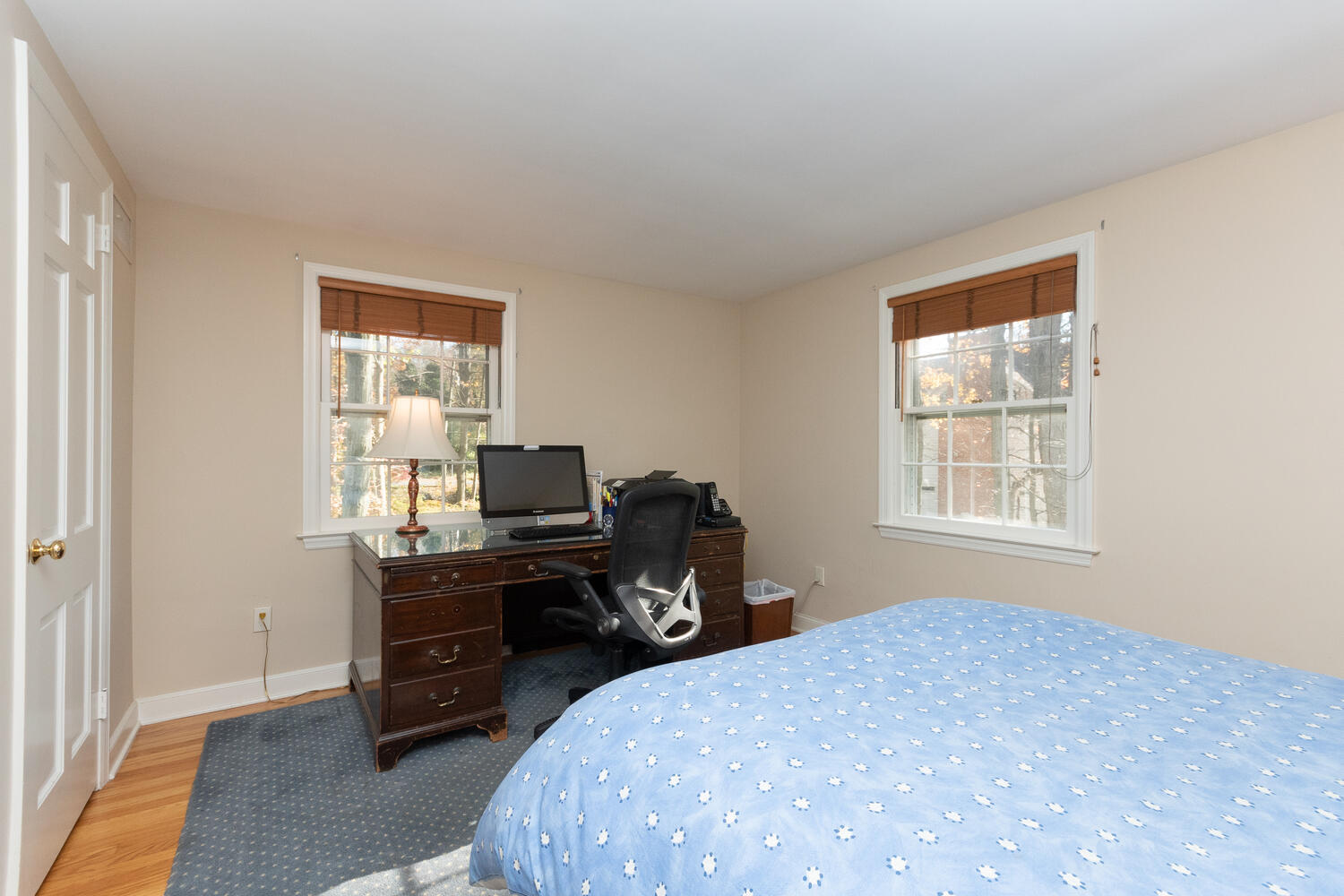 297 Brookside Road Darien, CT 06820 - Photo 40 of 63 a bedroom with a bed and a window