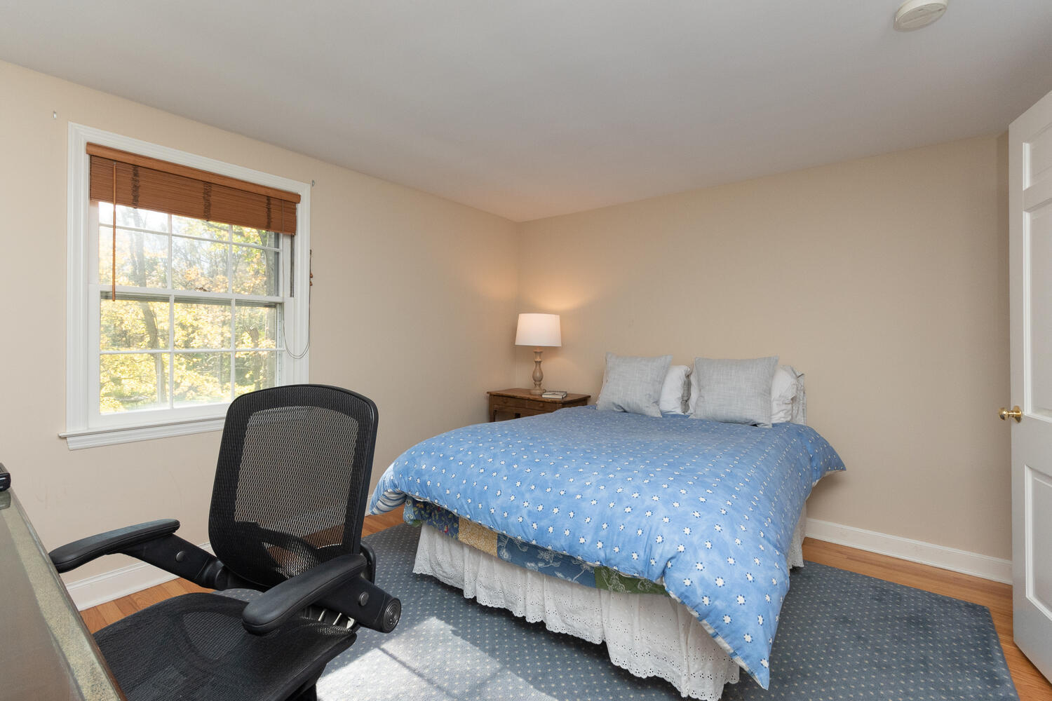 297 Brookside Road Darien, CT 06820 - Photo 41 of 63 a bedroom with a bed and a window