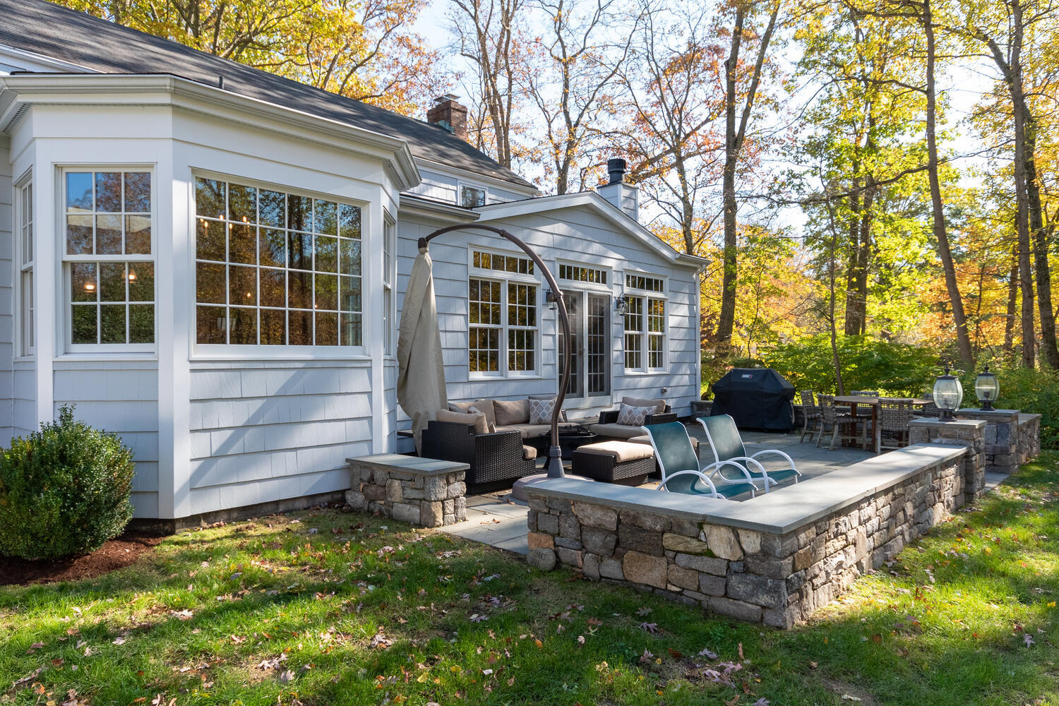 297 Brookside Road Darien, CT 06820 - Photo 49 of 63 a view of the house with backyard and sitting area