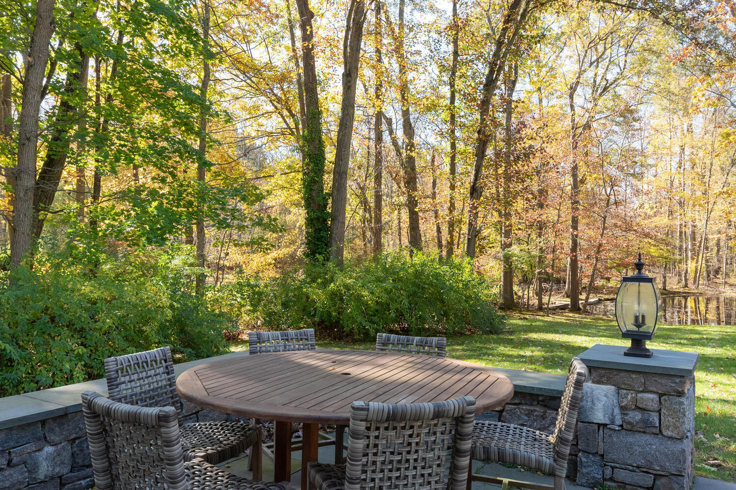 297 Brookside Road Darien, CT 06820 - Photo 50 of 63 a view of yard with seating area and trees around