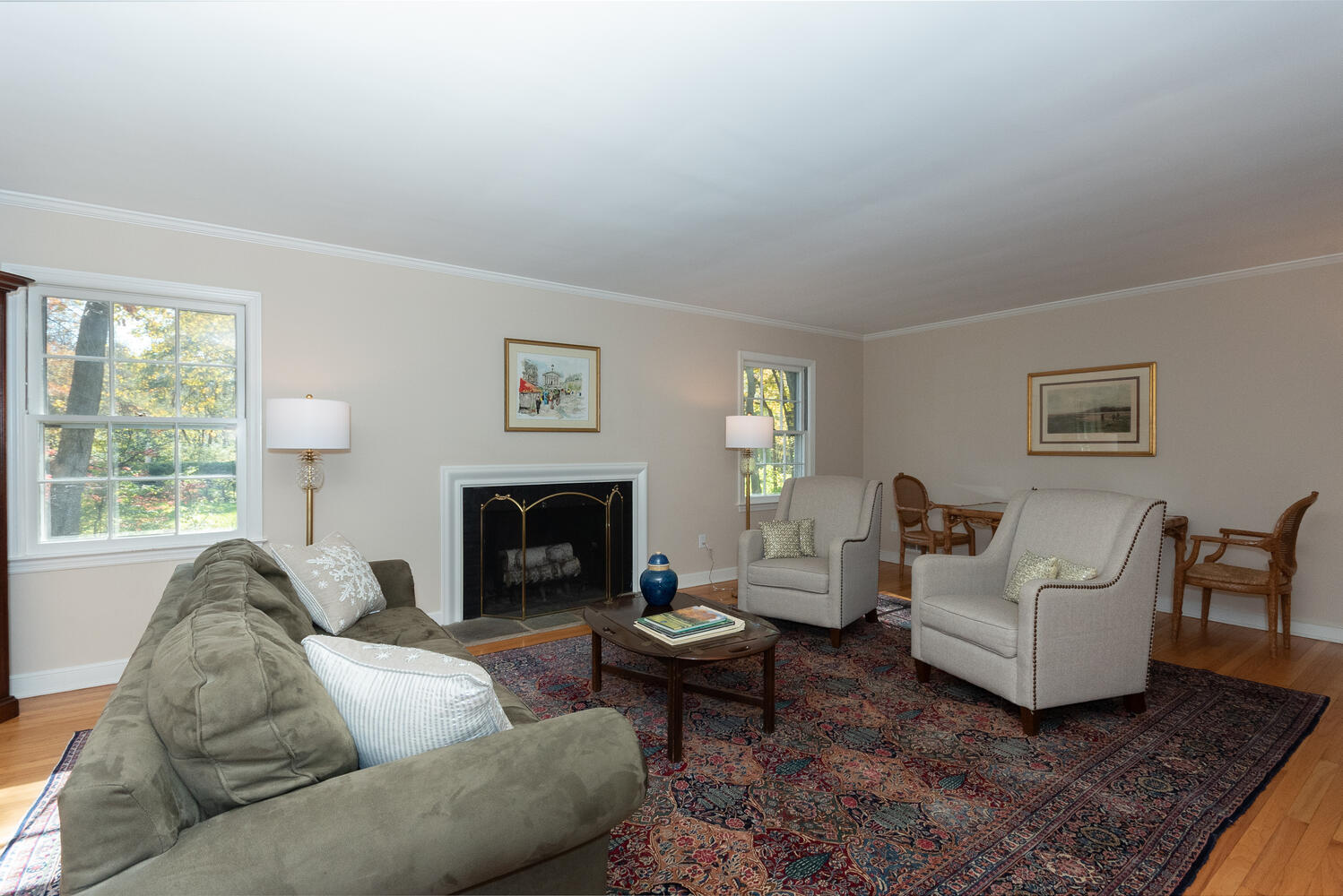 297 Brookside Road Darien, CT 06820 - Photo 9 of 63 a living room with furniture and a fireplace