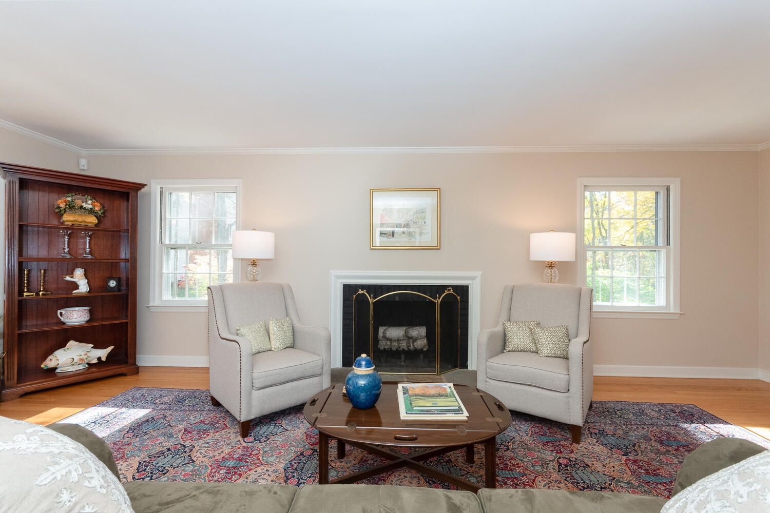 297 Brookside Road Darien, CT 06820 - Photo 10 of 63 a living room with furniture and a fireplace