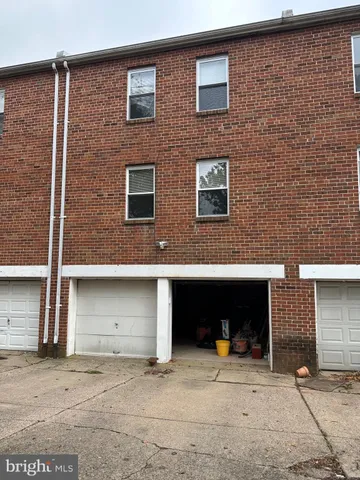 a front view of a house with yard