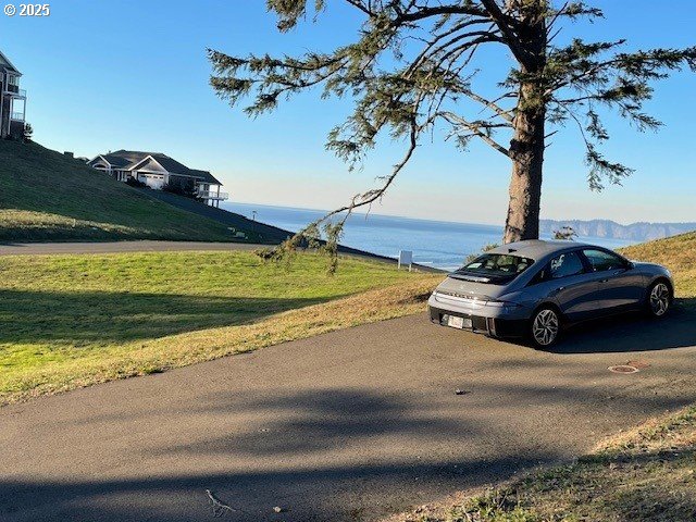 6405 SouthView Loop, Unit 45 Cloverdale, OR 97112 - Photo 5 of 8 a view of swimming pool with a yard