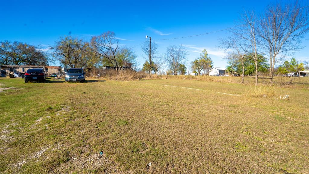 7000 County Road 131B Terrell, TX 75161 - Photo 21 of 24 a front view of a building with a yard