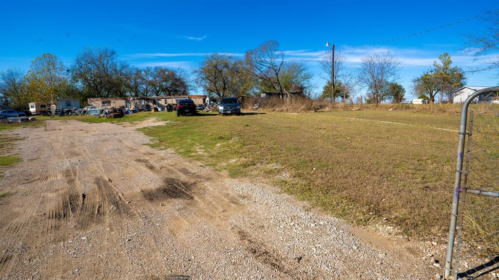 7000 County Road 131B Terrell, TX 75161 - Photo 3 of 24 a view of lawn chairs and yard