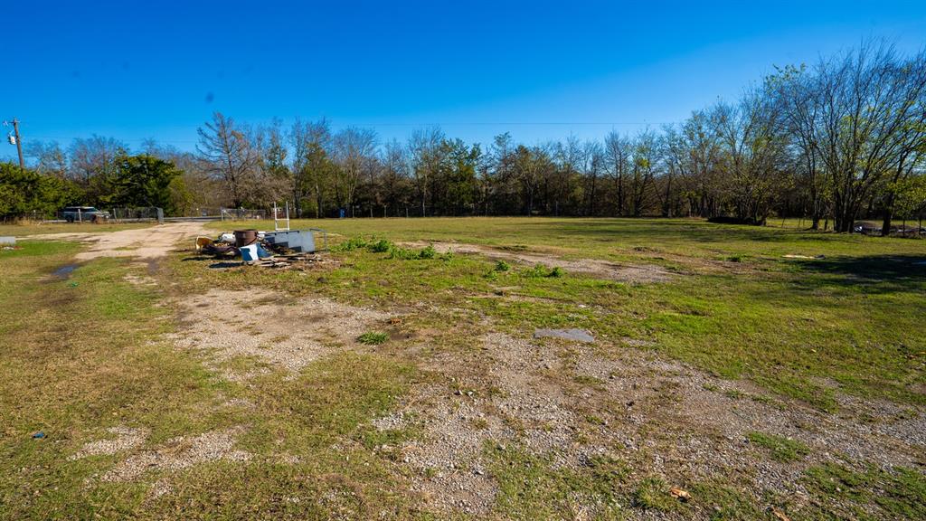 7000 County Road 131B Terrell, TX 75161 - Photo 5 of 24 a view of a yard with a house in the background