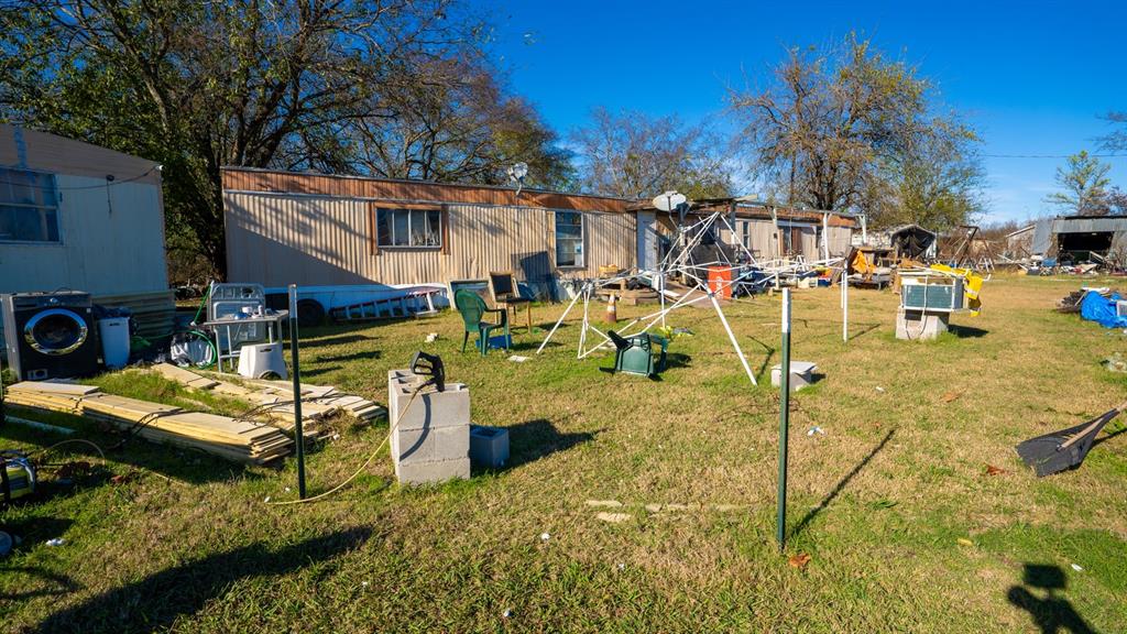 7000 County Road 131B Terrell, TX 75161 - Photo 7 of 24 a view of a swimming pool with a patio