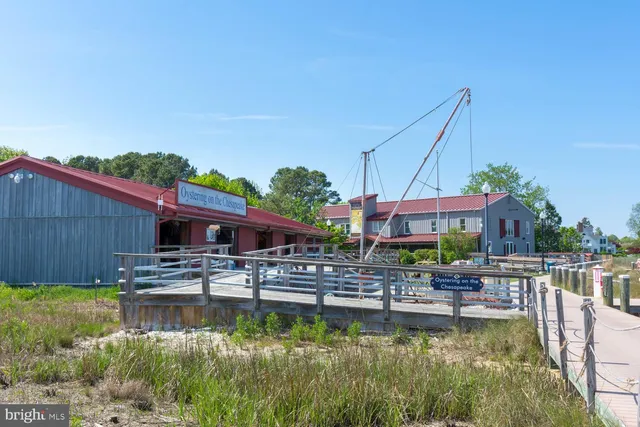 a view of a food mall next to a road