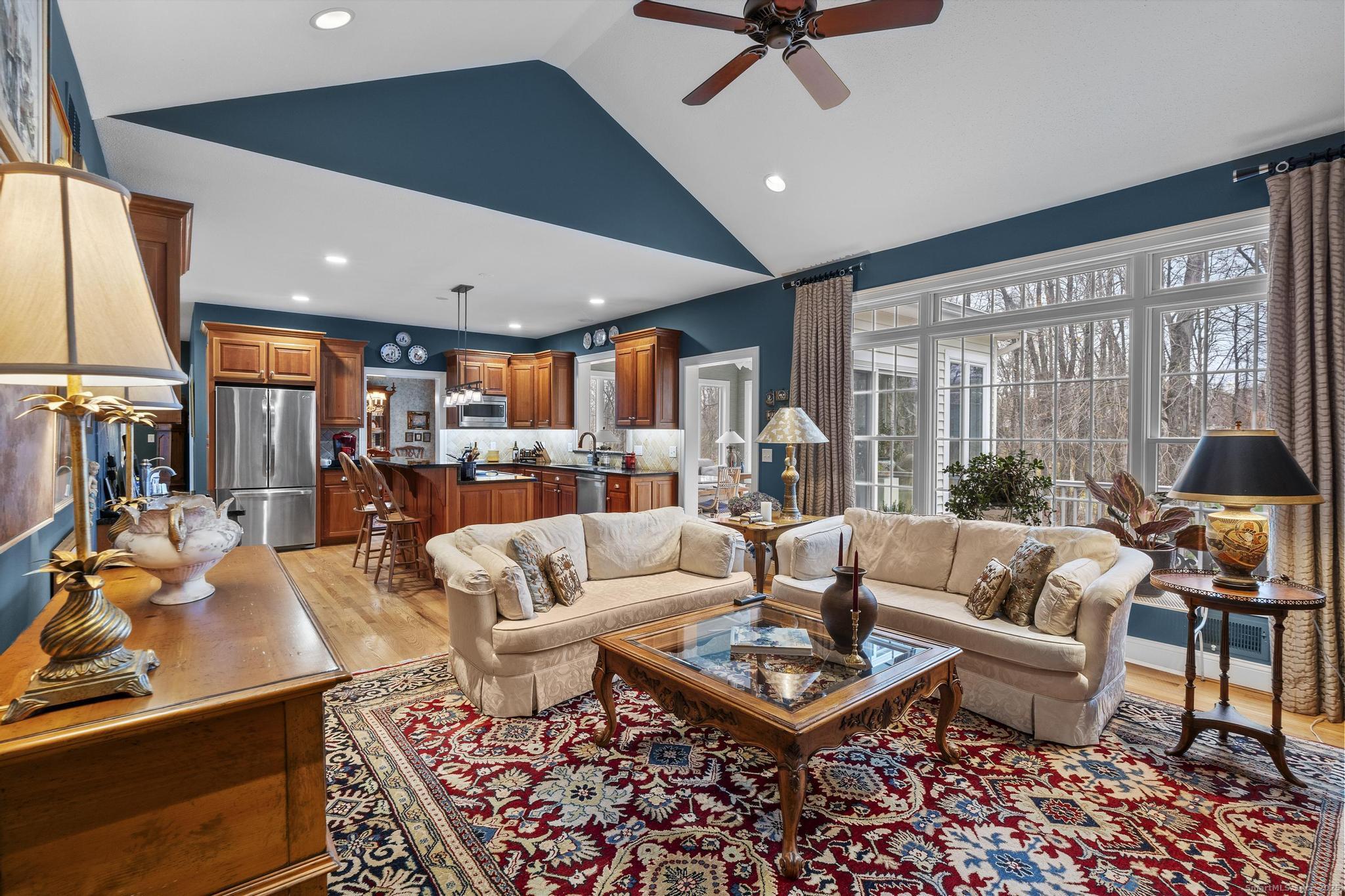 18 Daniel Circle, Unit 18 Suffield, CT 06078 - Photo 15 of 38 a living room with furniture a rug and a large window