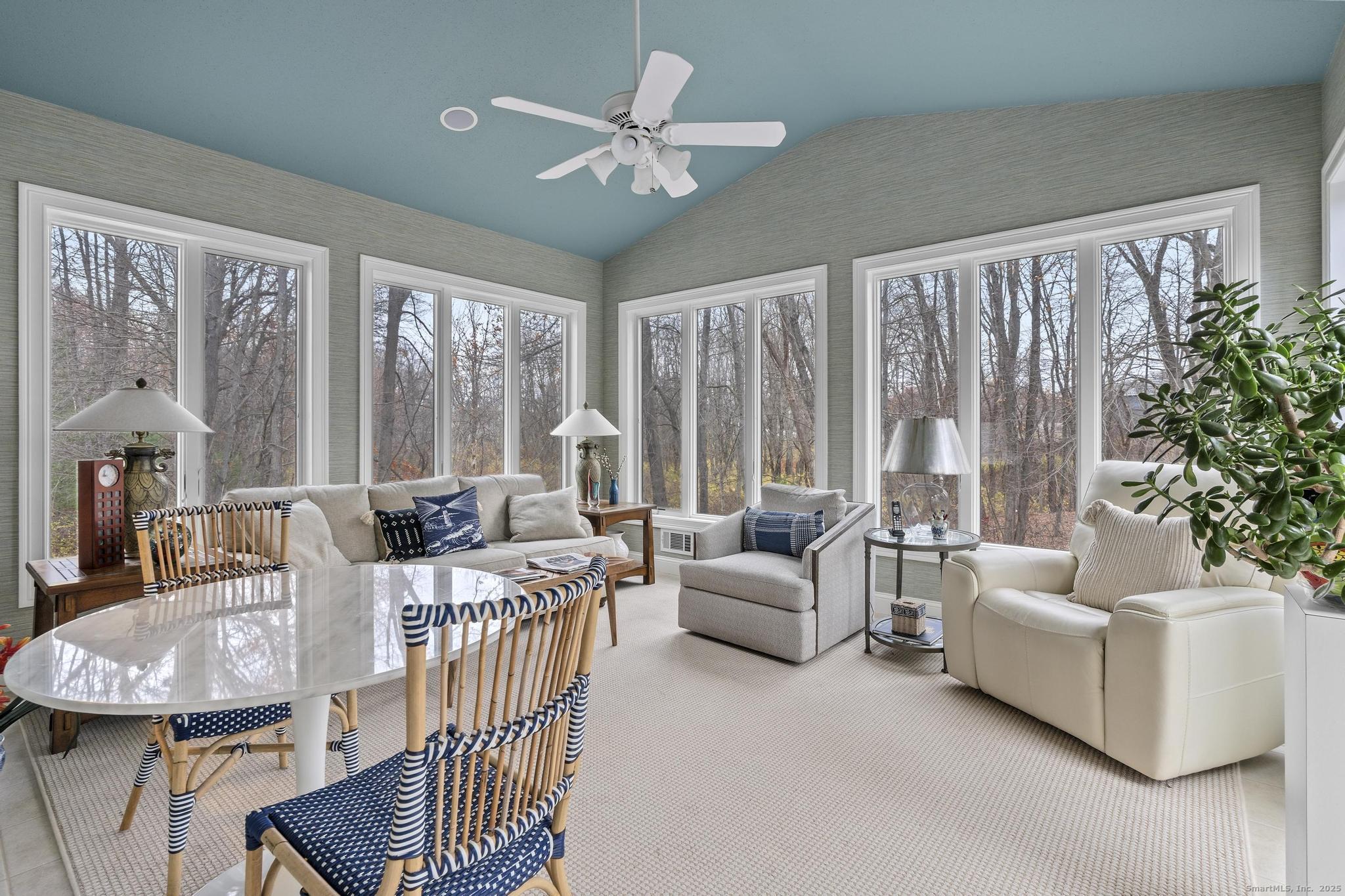 18 Daniel Circle, Unit 18 Suffield, CT 06078 - Photo 16 of 38 a living room with furniture and a large window