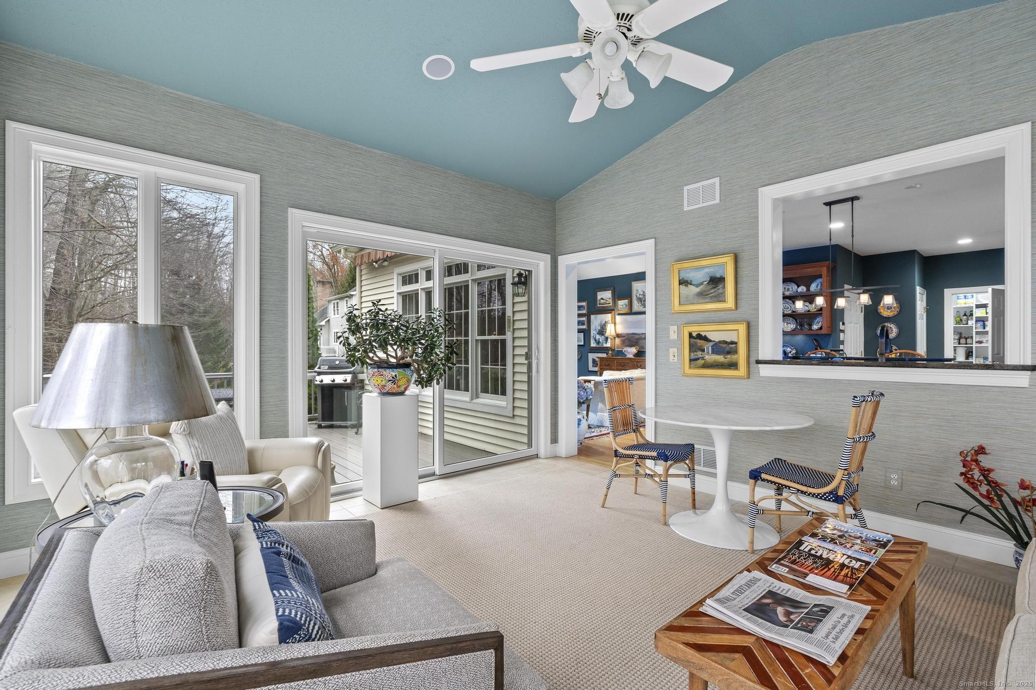 18 Daniel Circle, Unit 18 Suffield, CT 06078 - Photo 17 of 38 a living room with furniture and large windows