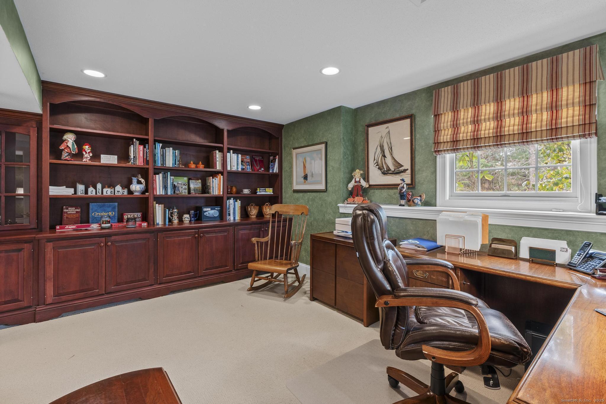 18 Daniel Circle, Unit 18 Suffield, CT 06078 - Photo 32 of 38 a view of a workspace with furniture and a window