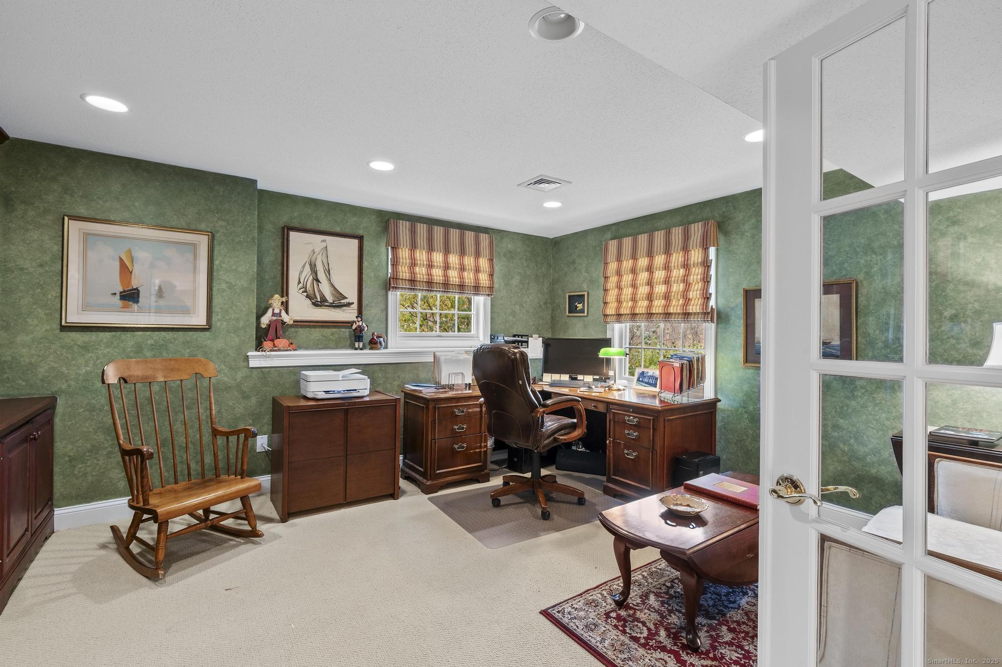 18 Daniel Circle, Unit 18 Suffield, CT 06078 - Photo 33 of 38 a view of a workspace with furniture and a window