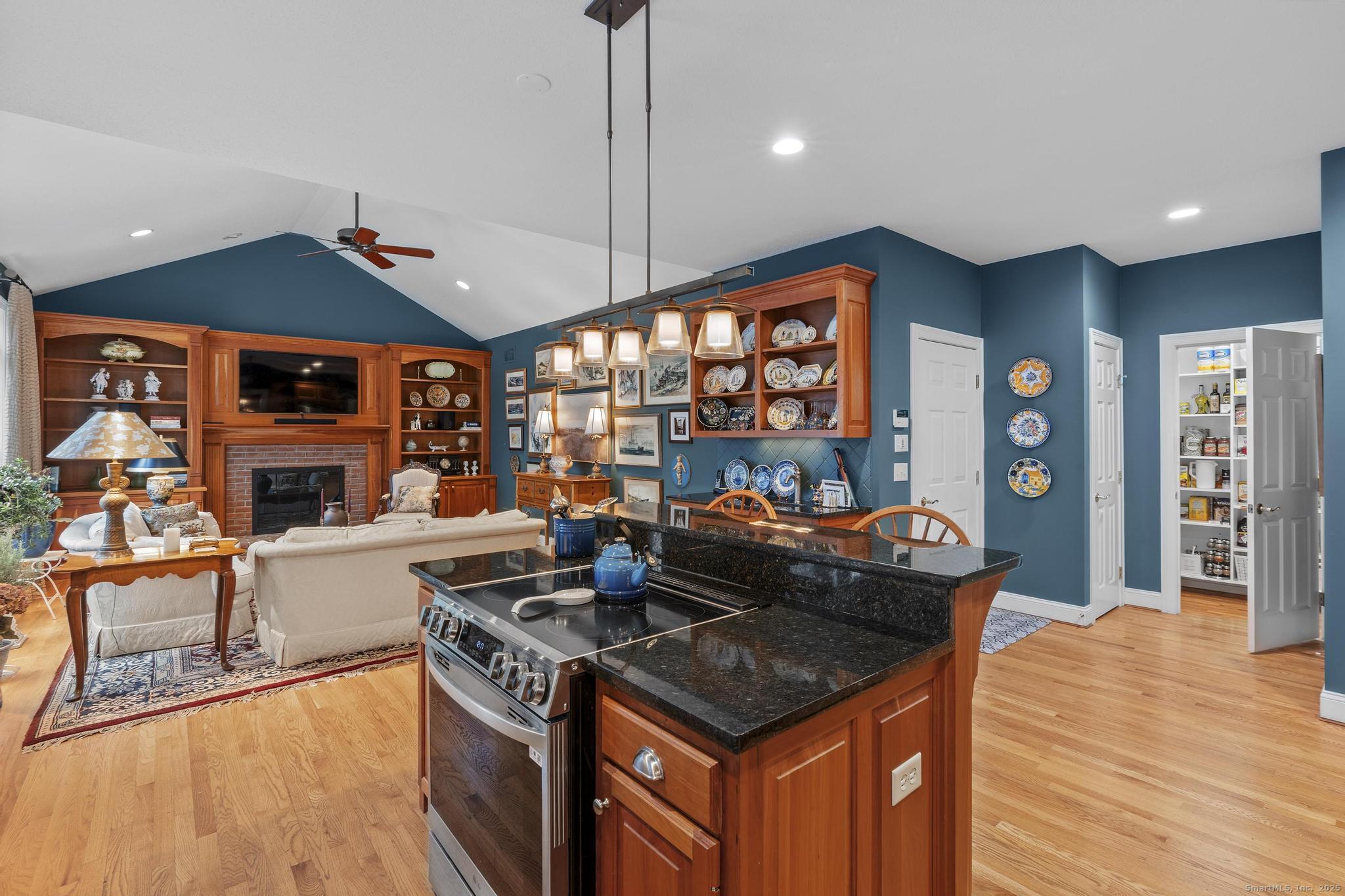 18 Daniel Circle, Unit 18 Suffield, CT 06078 - Photo 10 of 38 a kitchen with a stove and a wooden floors